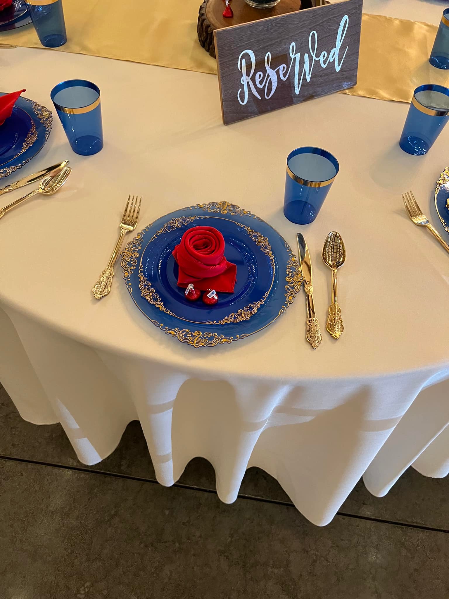 red napkin folded into rose