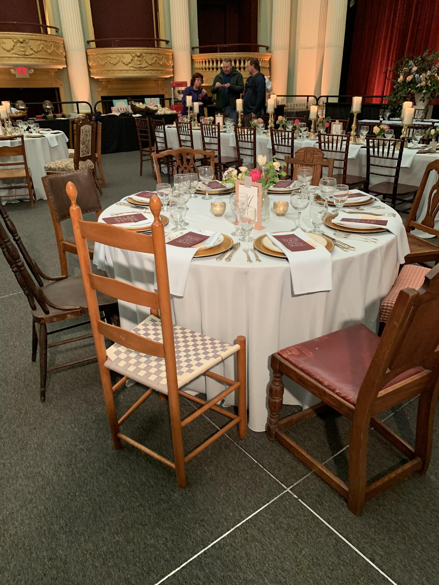 wedding reception tablescape with mix matched antique chairs